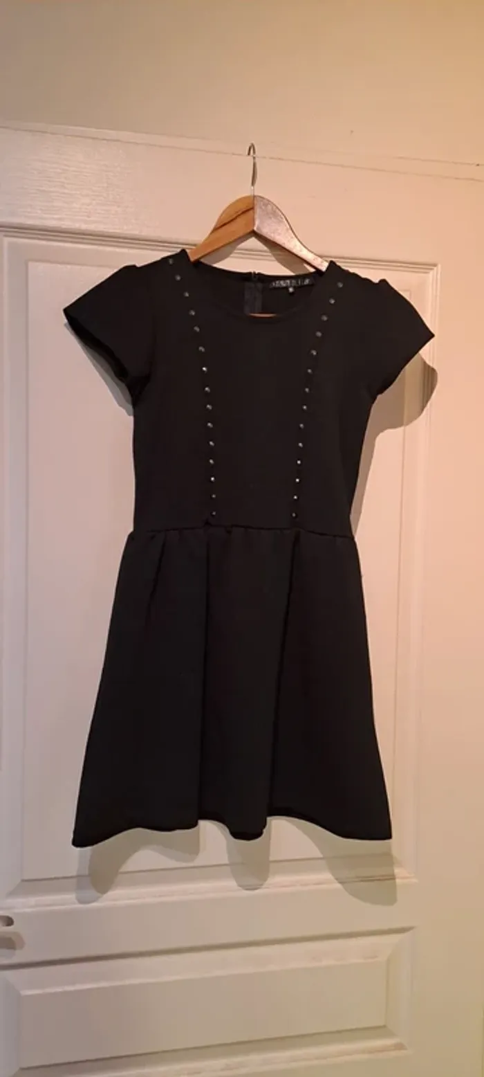 Robe hiver noire manches courtes - Marque Caprice de fille - Taille 10 ans - Très bon état.