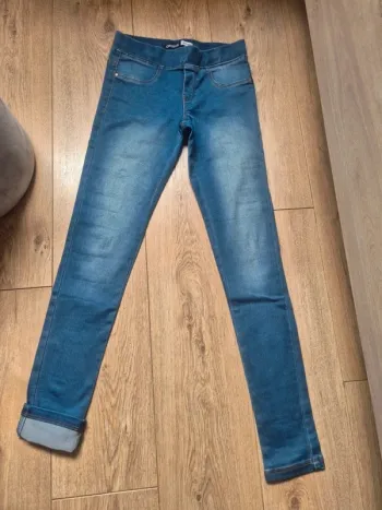 Pantalon tregging okaidi bleu 12 ans en parfait état