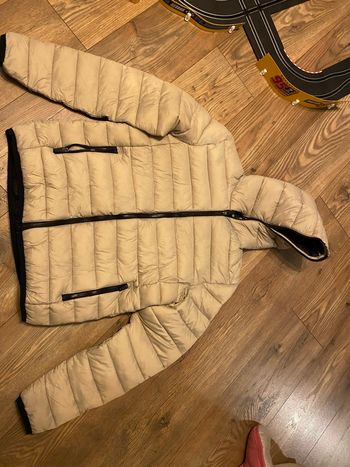 Veste doudoune femme taille S Daniel hills coloris beige bordure noire.