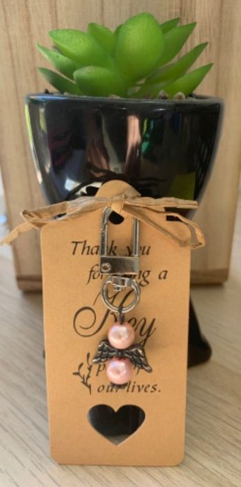 Porte-clés bijou de sacs ange avec perles roses