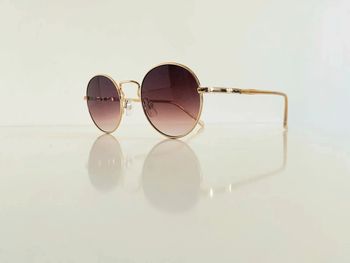 Lunette de soleil ronde mixte dorée verres marron dégradés UV protection taille small