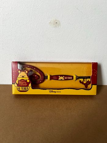 Clé 60e Anniversaire de Winnie l’Ourson et l’Arbre à Miel