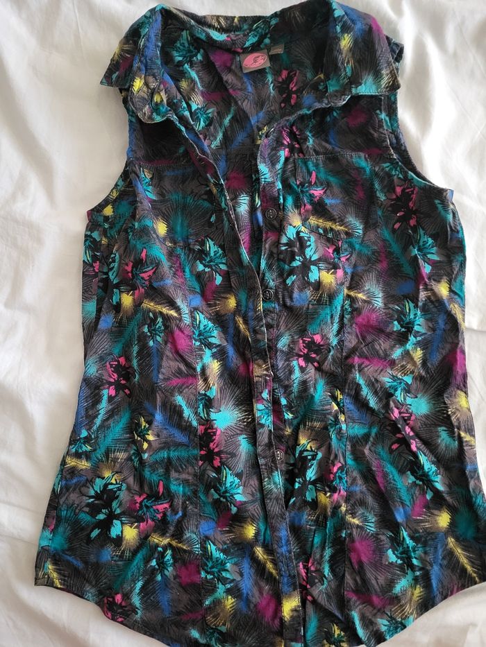 Chemise sans  manche 10 ans