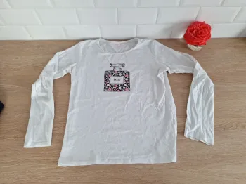 Haut motif bouteille de parfum