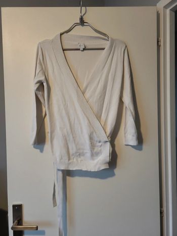 Gilet blanc cache cœur