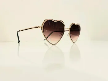 Lunette de soleil femme cœur marron et dorée verres dégradés UV protection catégorie 3