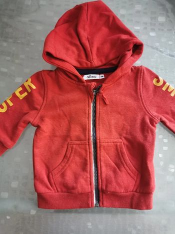 Gilet bébé orange rouille