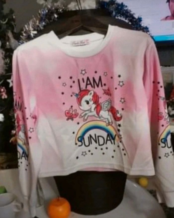 Très beau pull licorne comme neuf