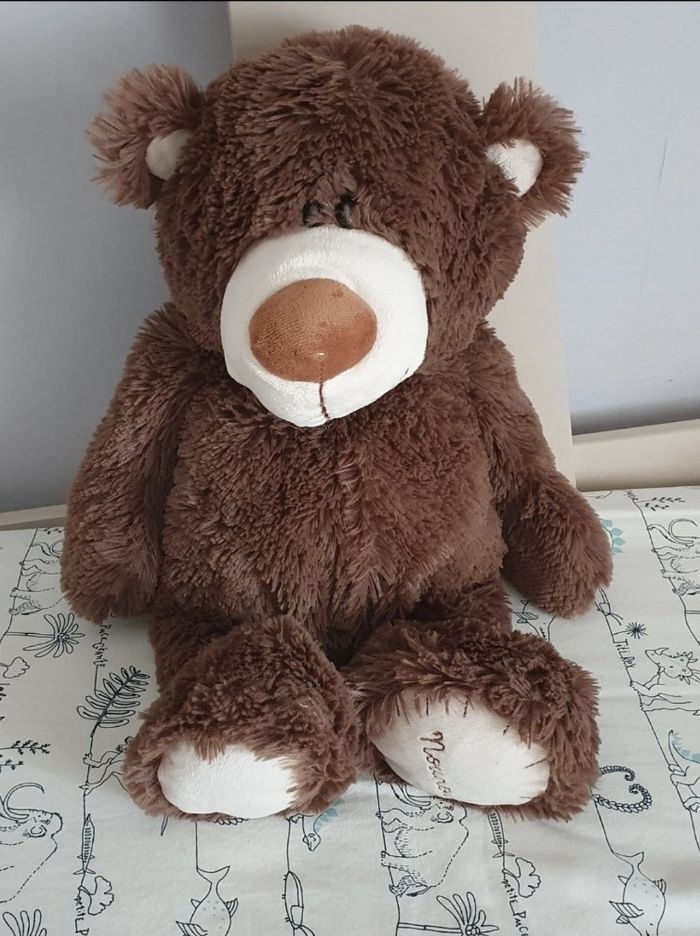 Grand ours en peluche marron
