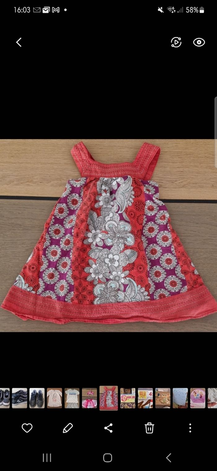 Tunique orchestra motif fleurs 8 ans en bon état