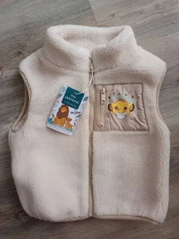 Veste fausse fourrure sans manches roi lion Disney taille 18-24mois neuve