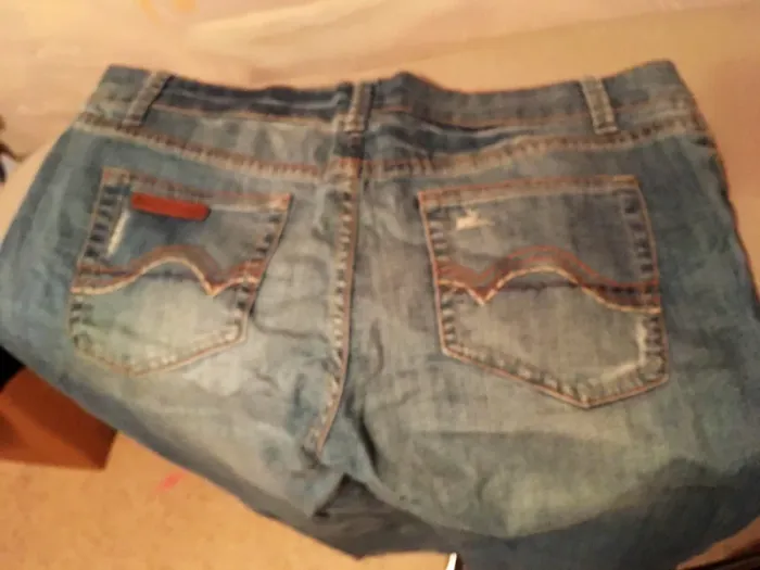 Jeans bleu troué @ - photo numéro 3