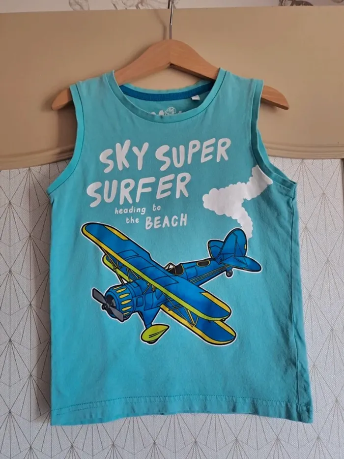 Débardeur garçon turquoise palomino 6 ans 1 micro tâche qu'on ne voit pas