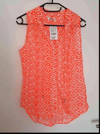 Chemise  flashy  sans manche  taille  36