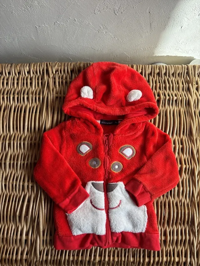 Veste polaire 12mois en très bon état
