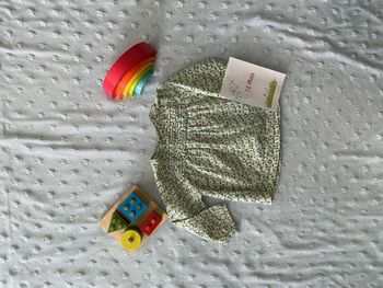 blouse manches longues gris à motifs ouverture totale au dos 12 mois obaibi