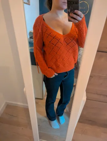 Pull rouge réversible