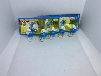 Lot de 5 figurines schtroumpfs 2010 et leur papier