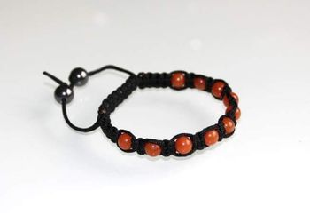 Bracelet shamballa noir et calcite orange