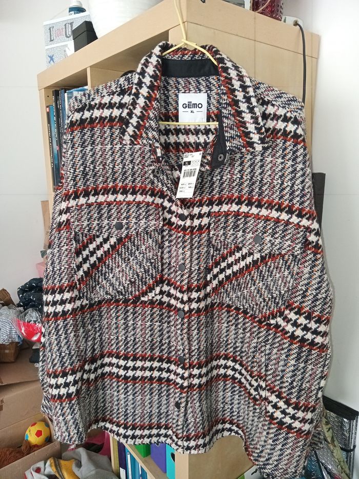 Veste hiver marron et beige.