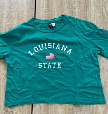 Top court vert USA H&M très bon état 
