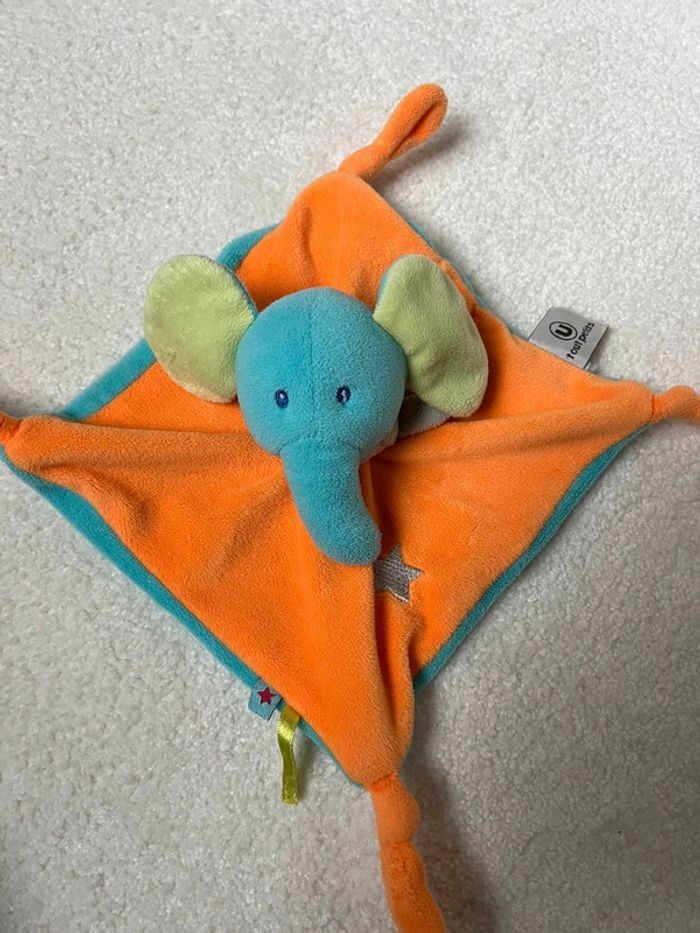 Doudou plat éléphant orange U tout petits