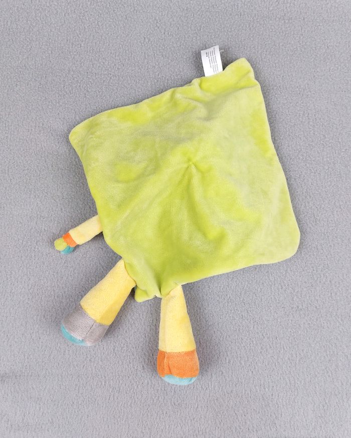 Doudou plat lion jaune vert bleu orange NICOTOY blanc écharpe oiseau toucan état neuf - photo numéro 2