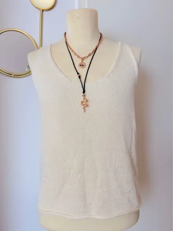 Joli top sans manches blanc tricot Taille L Bristol