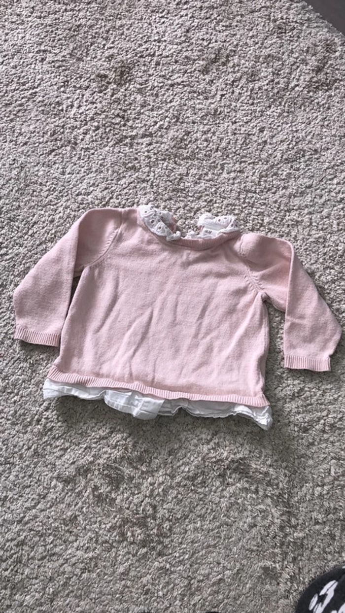Pull rose et blanc