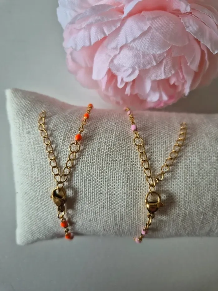 Lot de 2 bracelets d'été dorée style gigi
en acier inoxydable orange et rose - photo numéro 2