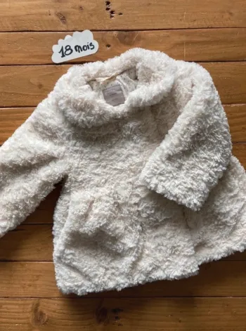 Manteau fausse fourrure
