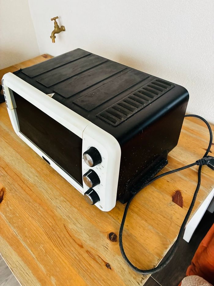 Petit four posé libre Delonghi EO12562 pour pièces - photo numéro 3