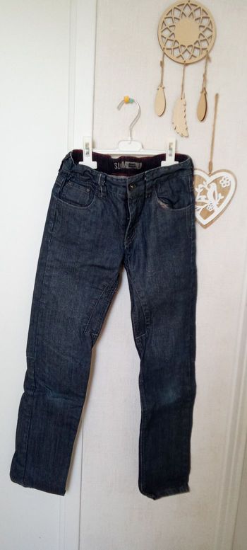 Jean garçon bleu Okaïdi en 10 ans effet ciré