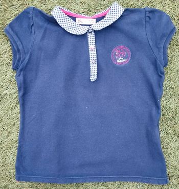 Beau petit polo bleu marine