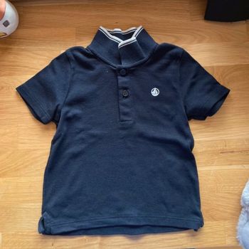 Polo bébé en très bon état petit bateau