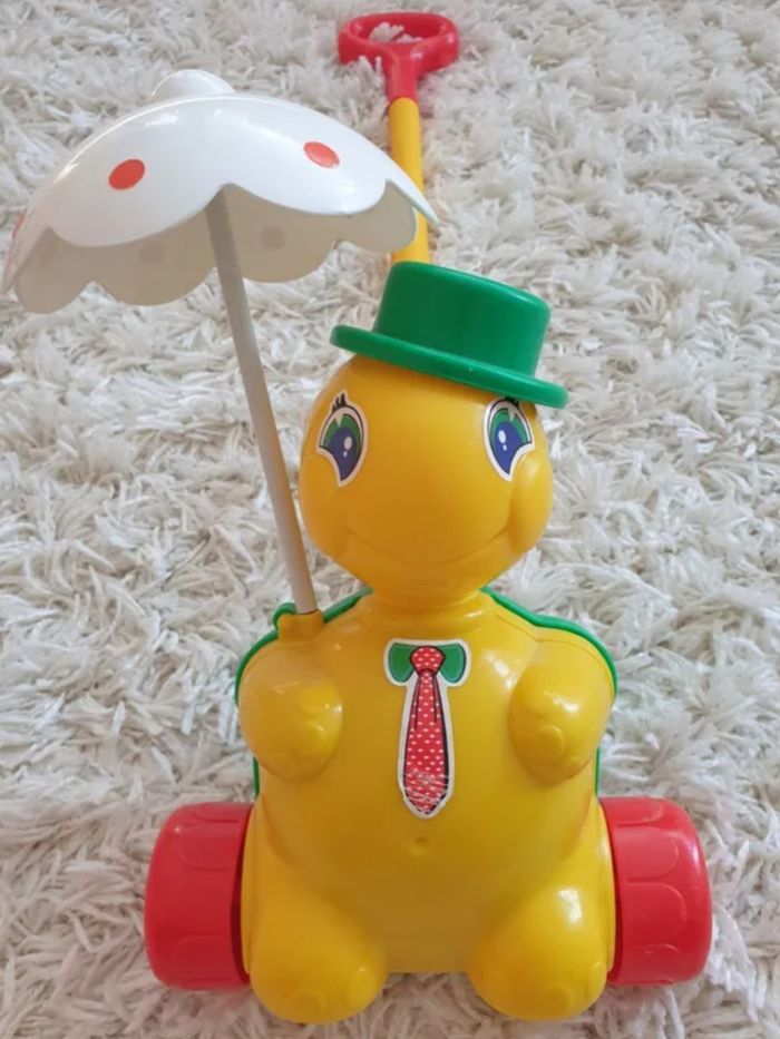 Jouet à pousser - photo numéro 7