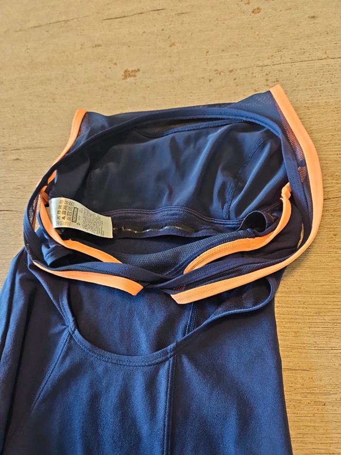 Maillot de bain 1 piéce femme bleu foncé, bord orangé, taille 38, peu mis - photo numéro 9