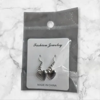 Boucle d’oreille argentée pendentif cœur neuve