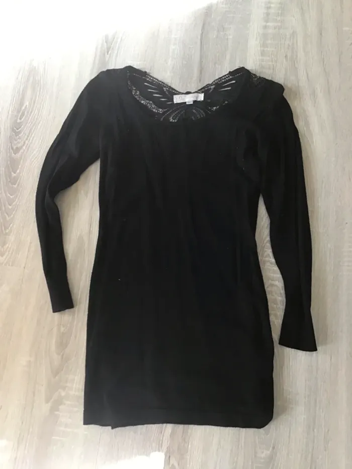 Pull noir avec dos papillon