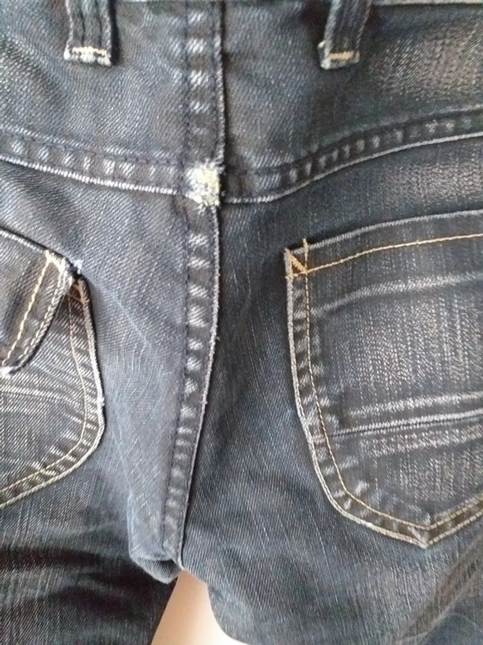 Jeans foncé effet délavé par endroits - photo numéro 4