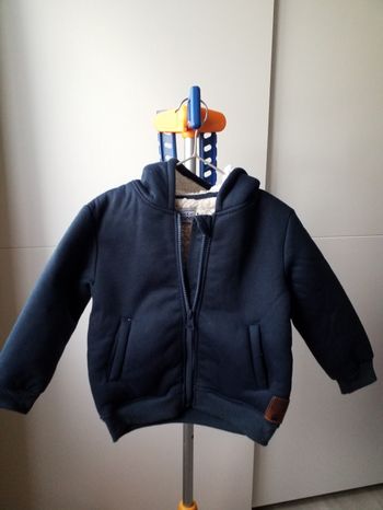 Veste sweat fourrée à capuche