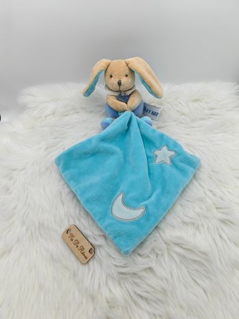 Doudou pantin Lapin Luminescent avec son mouchoir bleu beige blanc Baby Nat BN0137