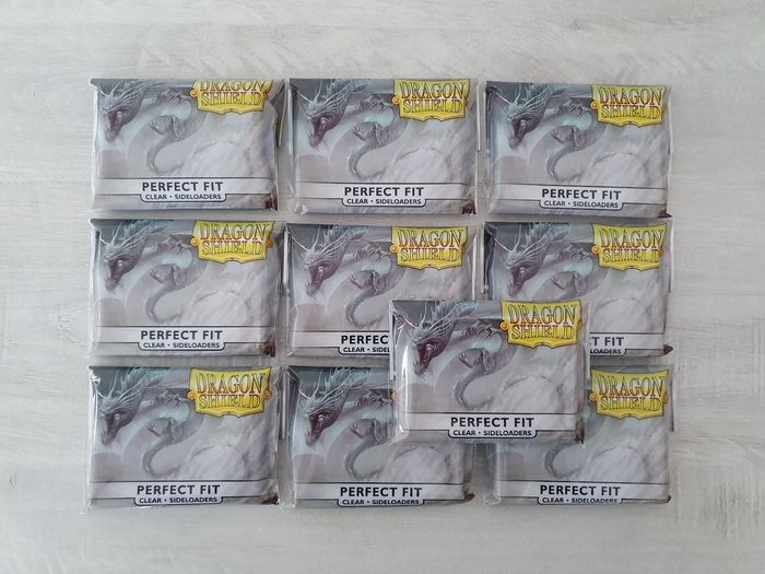 Lot de 10 paquets de 100 sleeves  Dragon Shield Perfect Fit Sideloaders