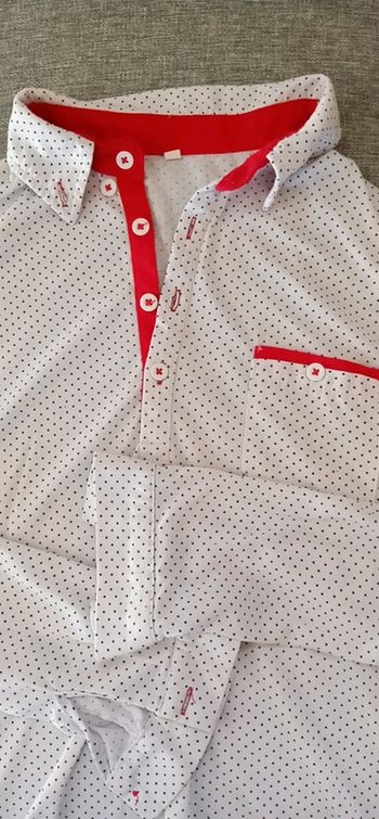 Polo manche longue blanc à pois noir