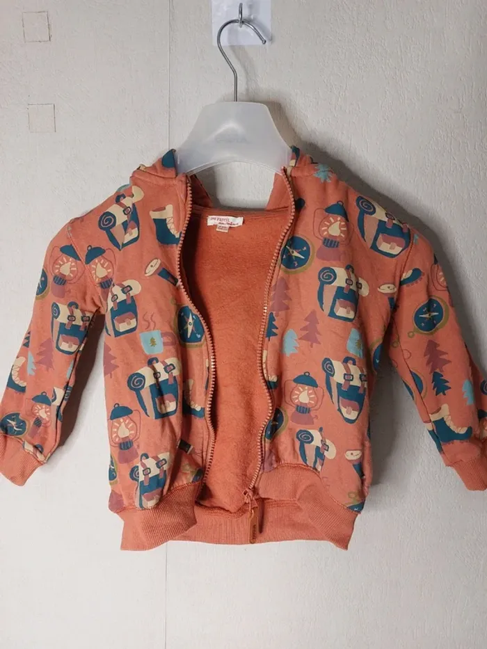 Veste avec capuche orange imprimé "Du pareil au même"
