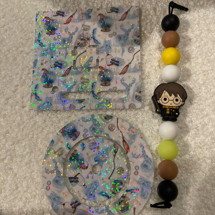 2 stickers et 1 cache poussière