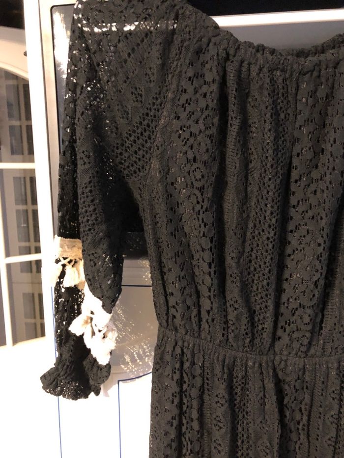 Robe longue asymétrique noire avec pompon - photo numéro 2