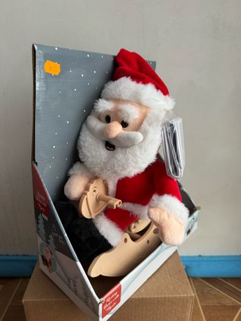 Peluche musicale traîneau de Noël