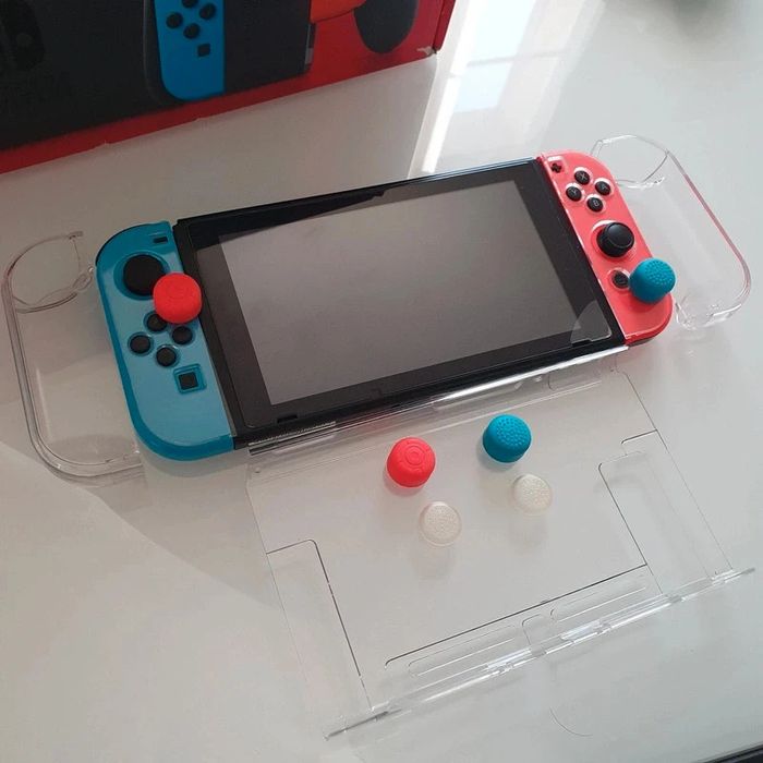 Switch complète + 2 jeux + 2 manettes - photo numéro 12