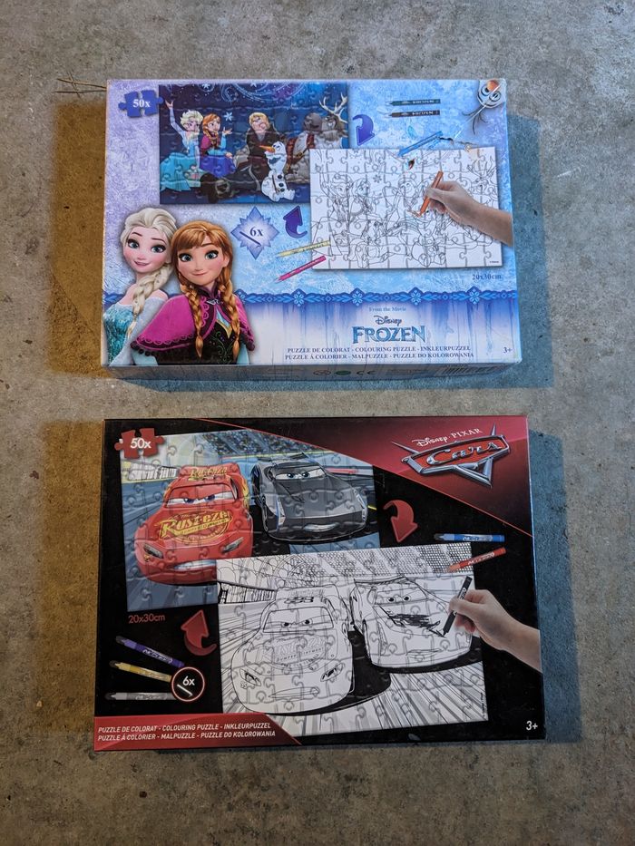 Lot de 2 puzzles 50 pieces Cars et Reine des neiges
